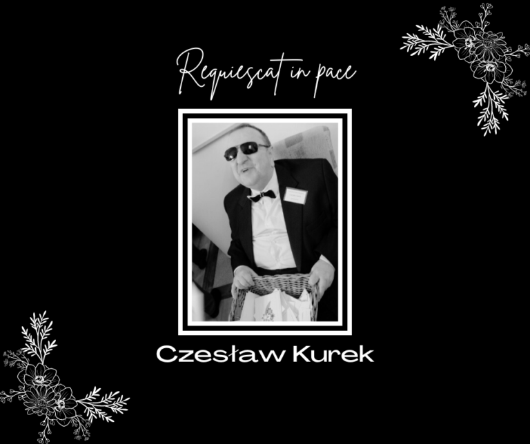 Czarno-białe zdjęcie Czesława Kurka w garniturze i ciemnych okularach.