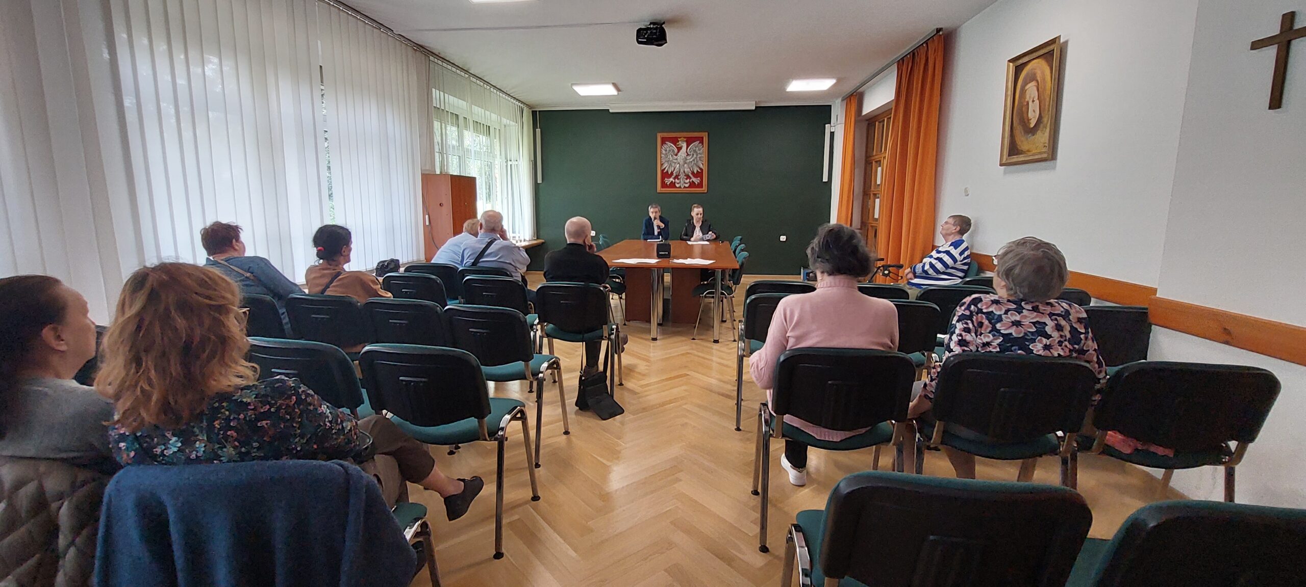 Uczestnicy słuchający wykładu przedstawicieli PFRON